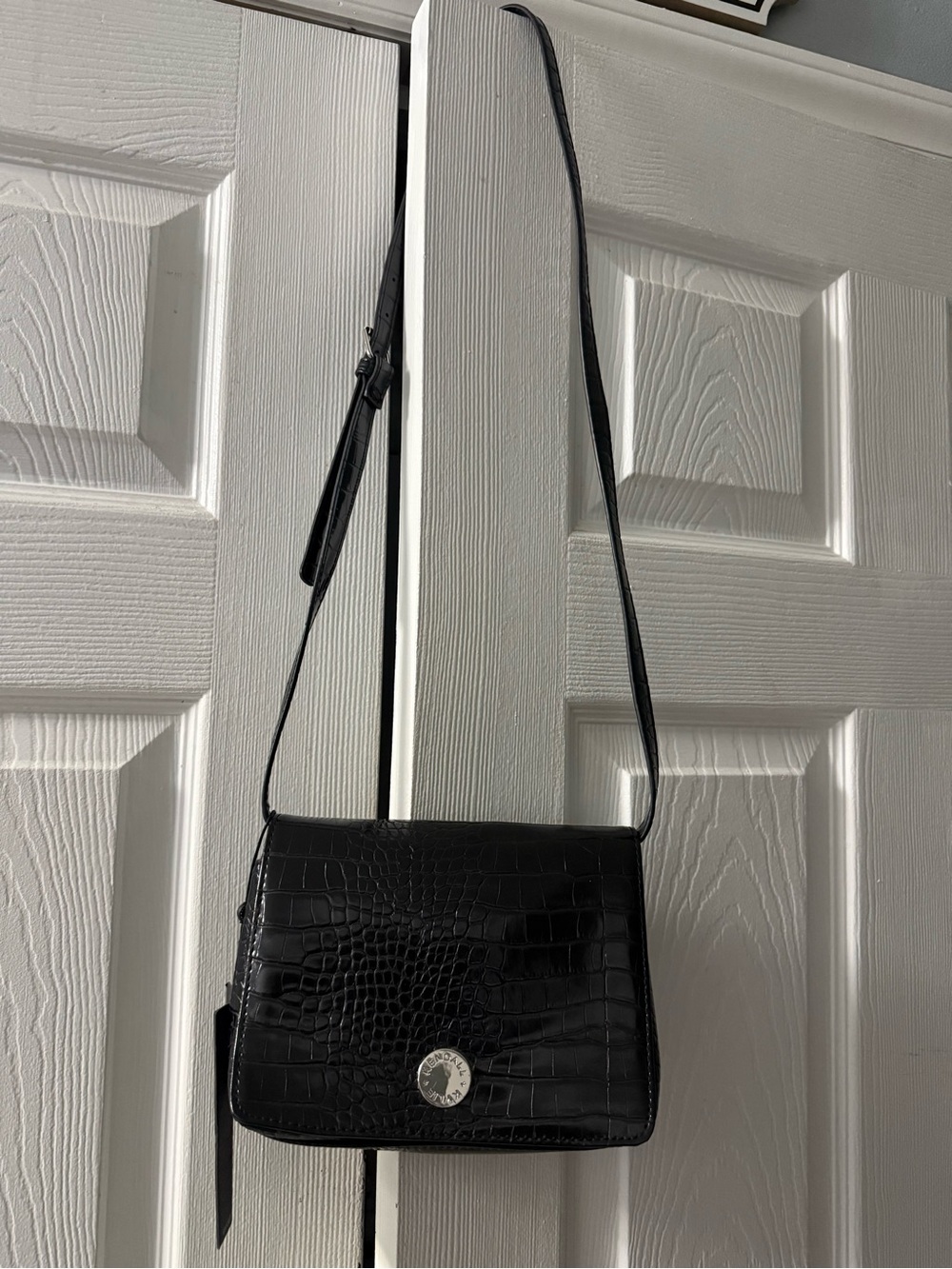 Kendall + Kylie black crocodile-embossed crossbody bag
